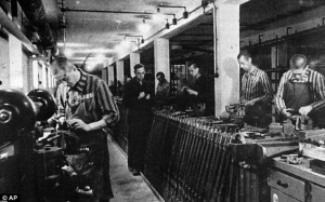 Slave labour: Jewish slave workers in striped uniforms work in a Nazi ammunition factory near Dachau concentration camp during World War II. WirtschaftsWoche has published a league table illustrating the Nazi past of top German firms like Bosch, Mercedes, Deutsche Bank, VW and many others, which involved the use of almost 300,000 slaves Read more: http://www.dailymail.co.uk/news/article-2663635/Revealed-How-Nazis-helped-German-companies-Bosch-Mercedes-Deutsche-Bank-VW-VERY-rich-using-slave-labor